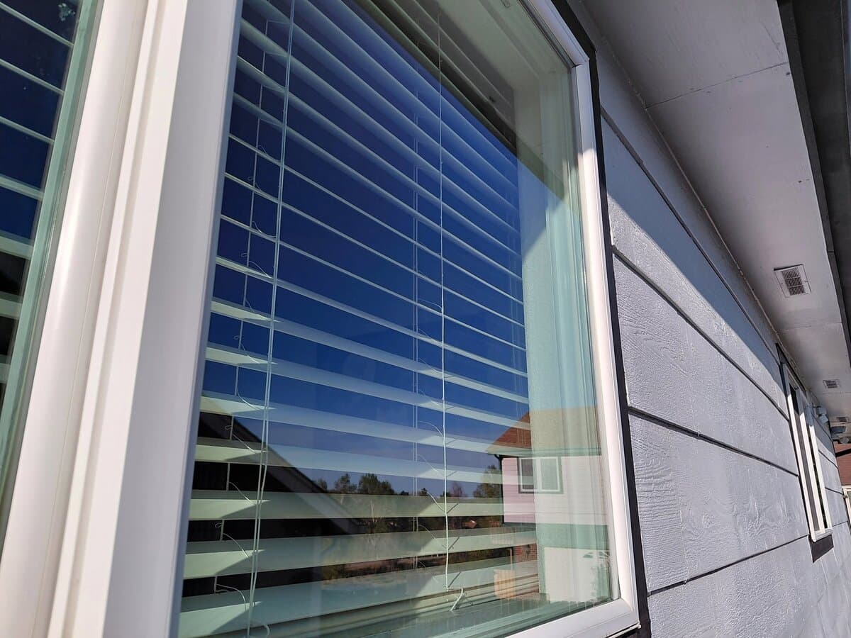 Freshly cleaned window with spotless glass and tracks